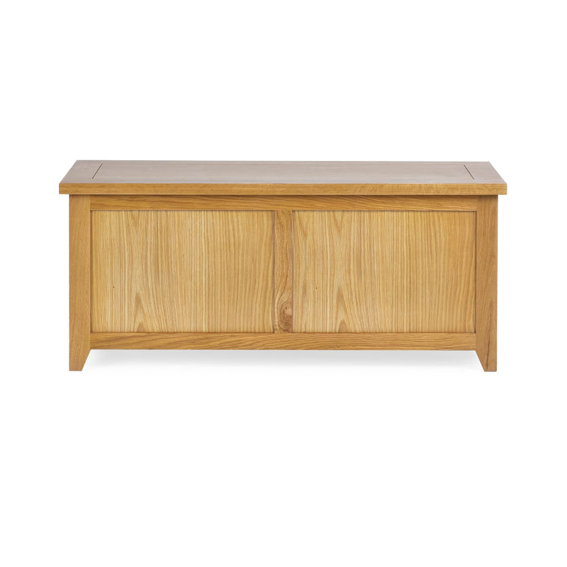 Wooden storage bench with a light finish on a white background