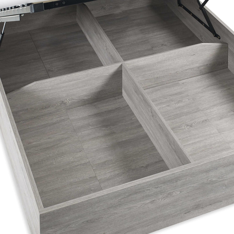 Wooden drawer with divided compartments on a white background