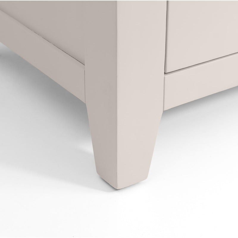 Close-up of a beige drawer corner on a white background