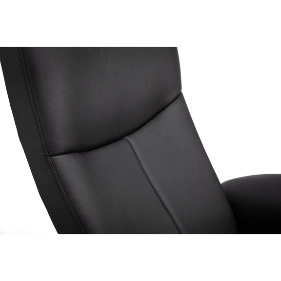 Close-up of a black leather chair on a white background