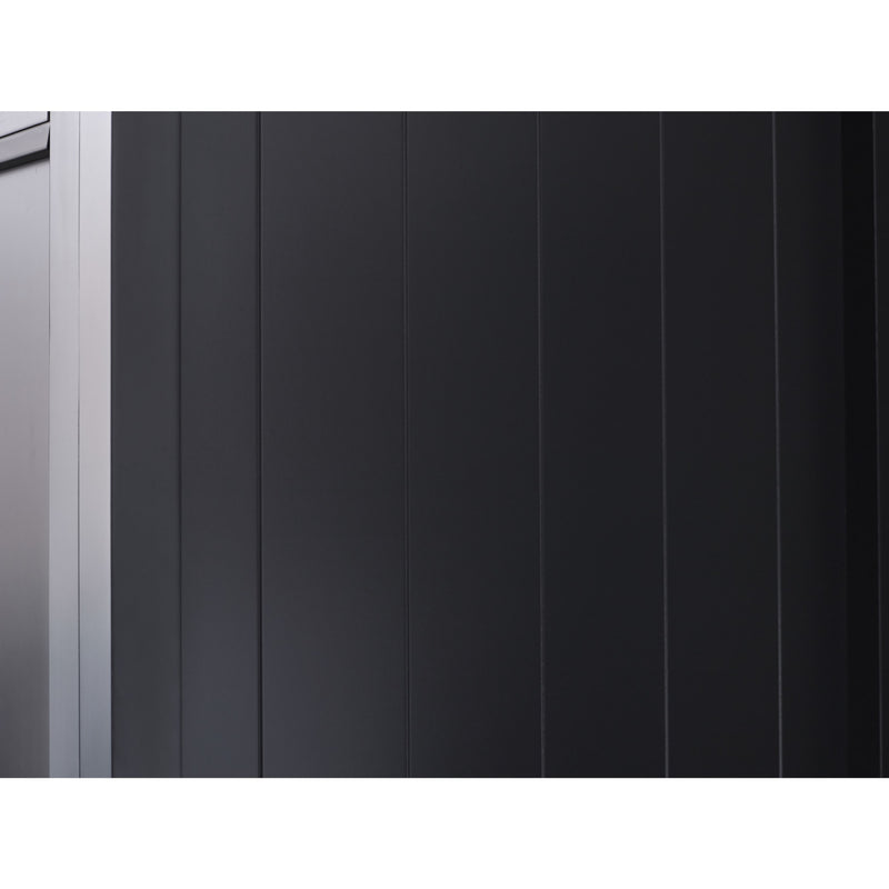 Close-up of a black panel with vertical lines on a white background