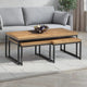 Wooden coffee table with metal legs in a living room setting