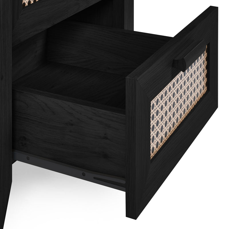 Black wooden drawer with decorative trim on a white background