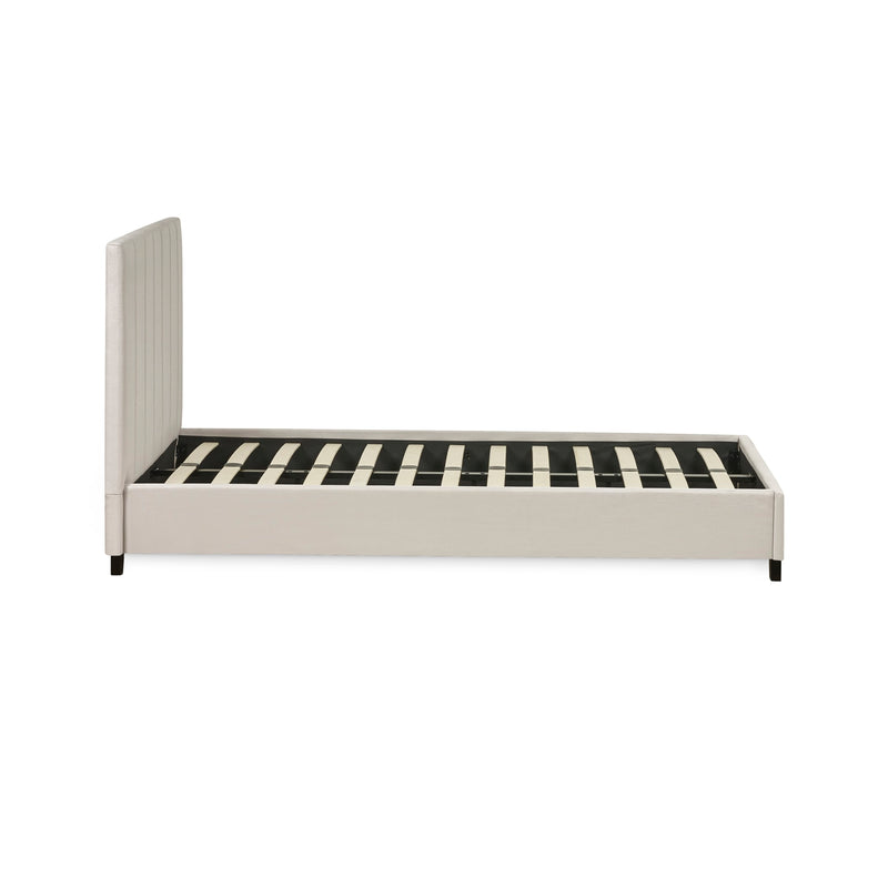 Bed with striped mattress on a white background