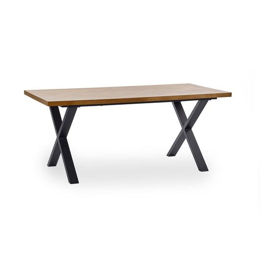 Wooden table with black metal legs on a white background
