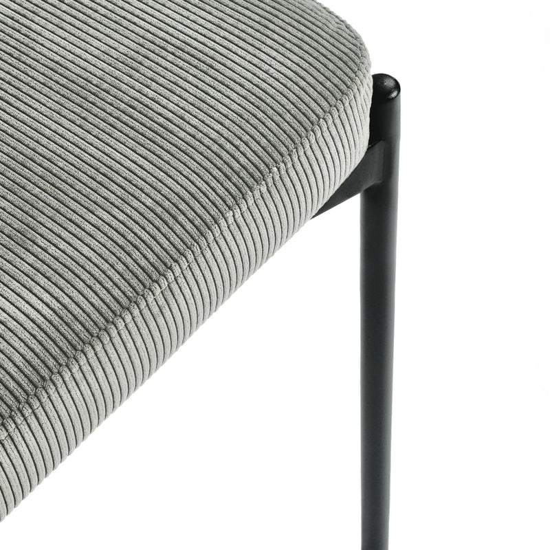 Gray corduroy chair with black metal frame on a white background