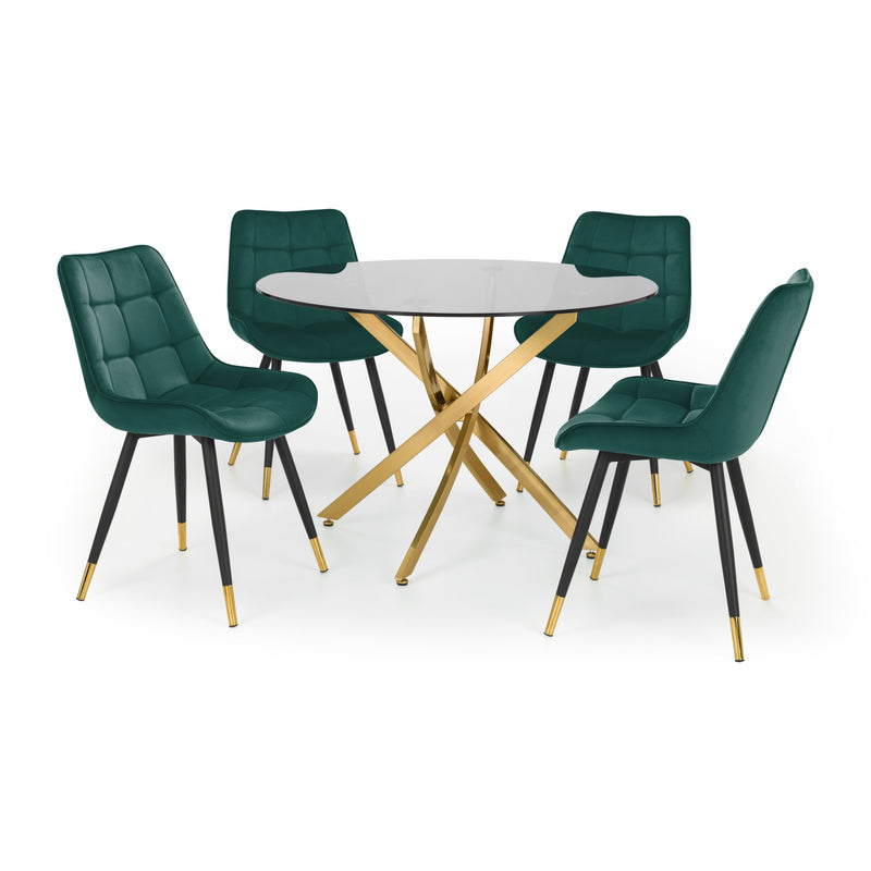 Dining table set with four green chairs on a white background