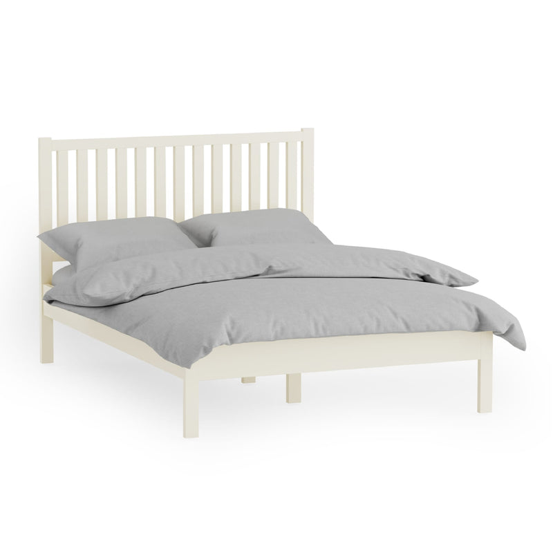 White bed frame with gray bedding on a white background