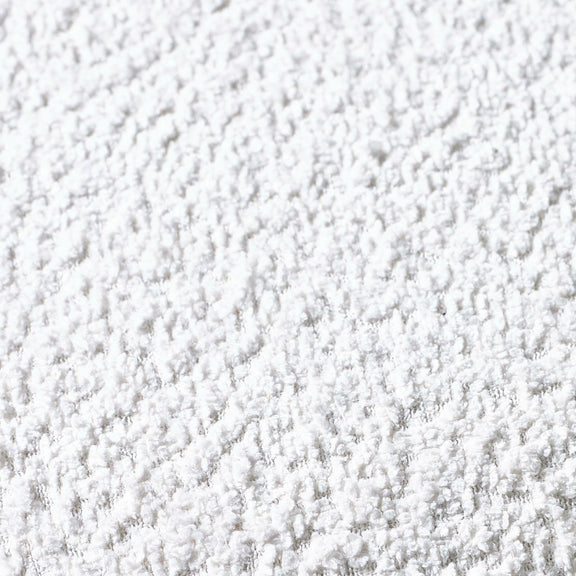 Close-up of white textured fabric