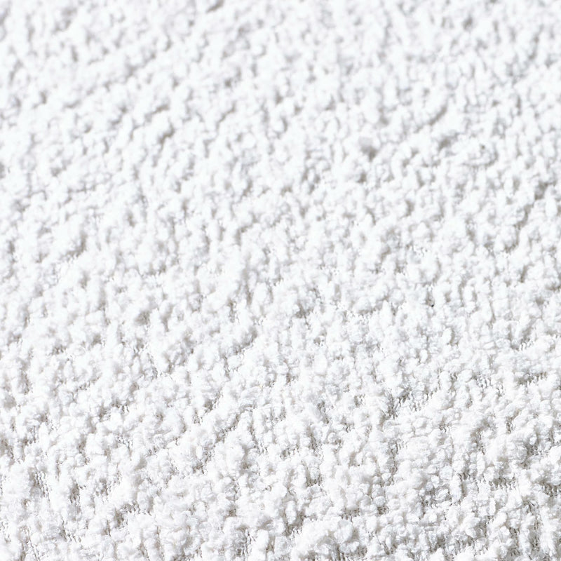 Close-up of white textured fabric