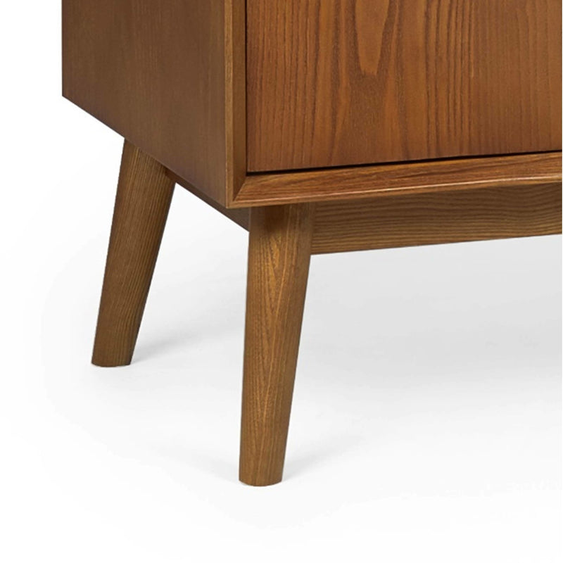 Wooden cabinet with legs on a white background