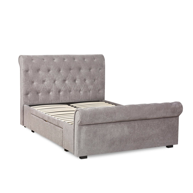 Wooden bed with drawers on a white background
