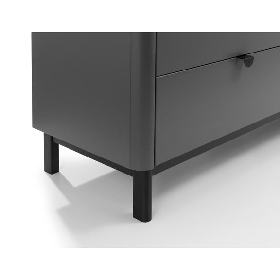 Dark gray dresser with black legs on a white background