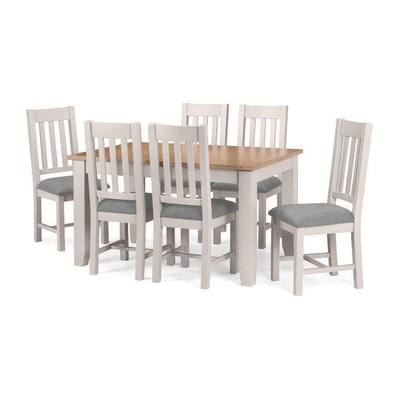 Dining set with a wooden table and six chairs on a white background