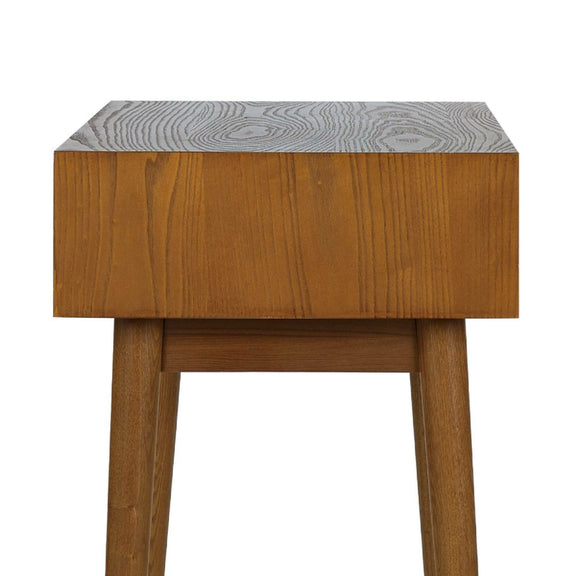 Wooden side table with a patterned top on a white background