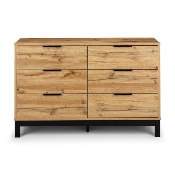 Wooden dresser with six drawers on a white background
