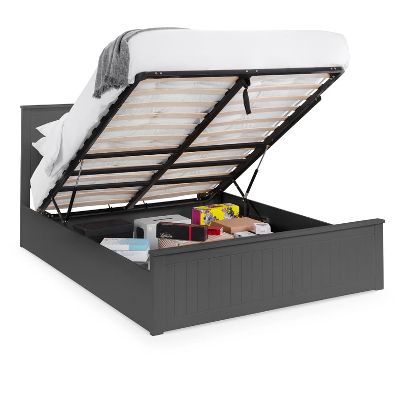 Black bed frame with open storage compartment on a white background