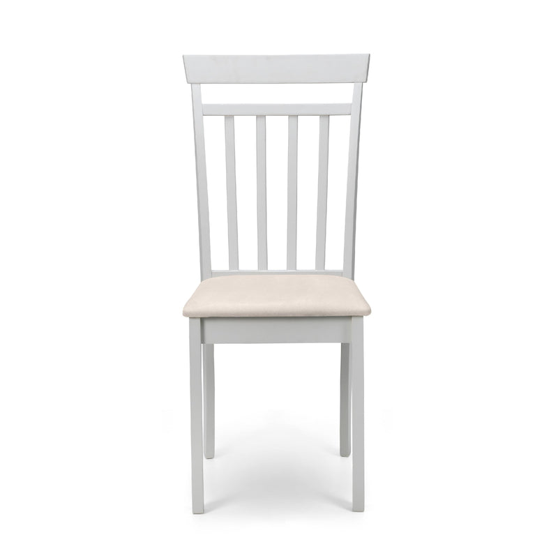 White chair with a cream cushion on a white background
