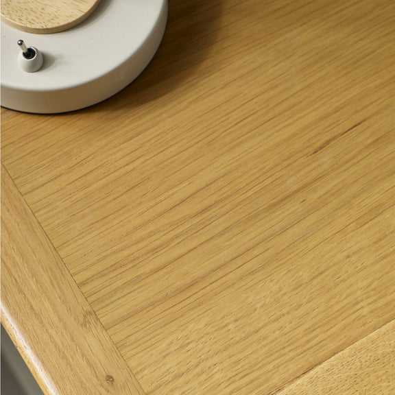 Close-up of oak effect tabletop with natural wood grain finish
