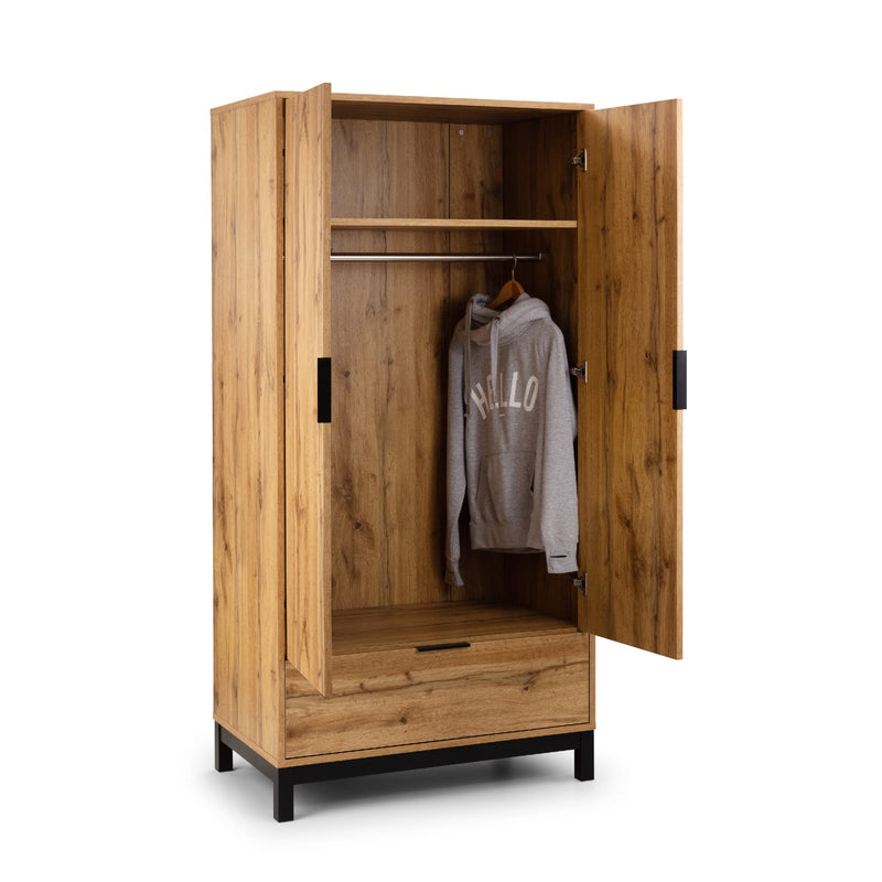 Wooden wardrobe with open doors displaying a hoodie on a white background