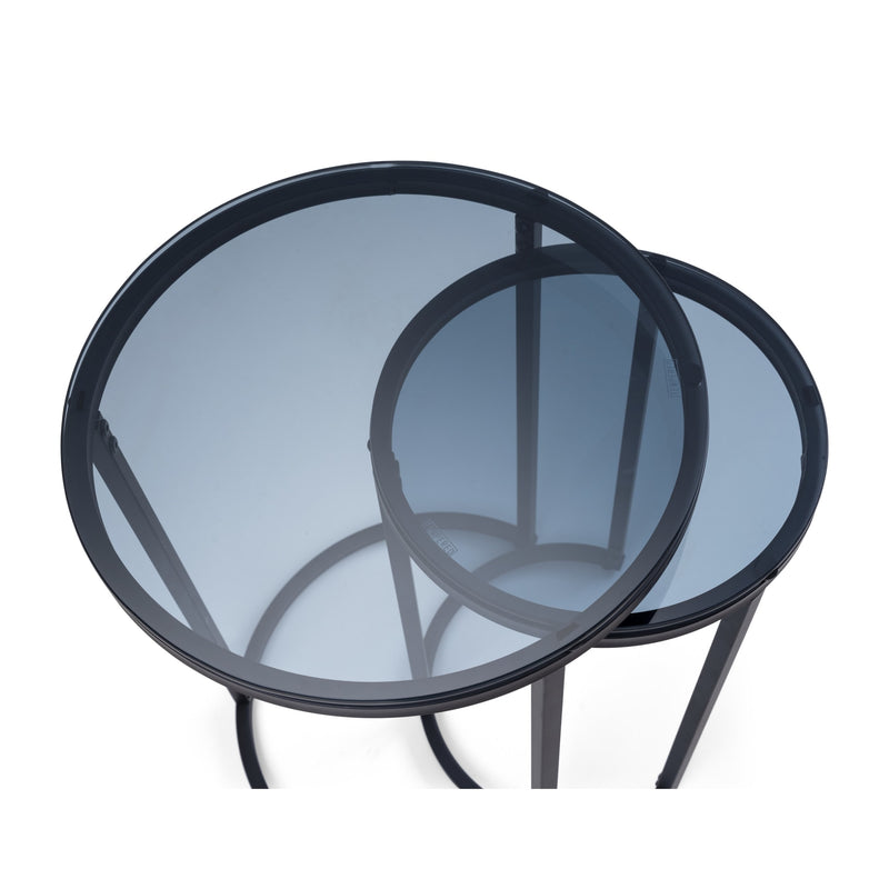 Two round glass tables with black metal frames on a white background