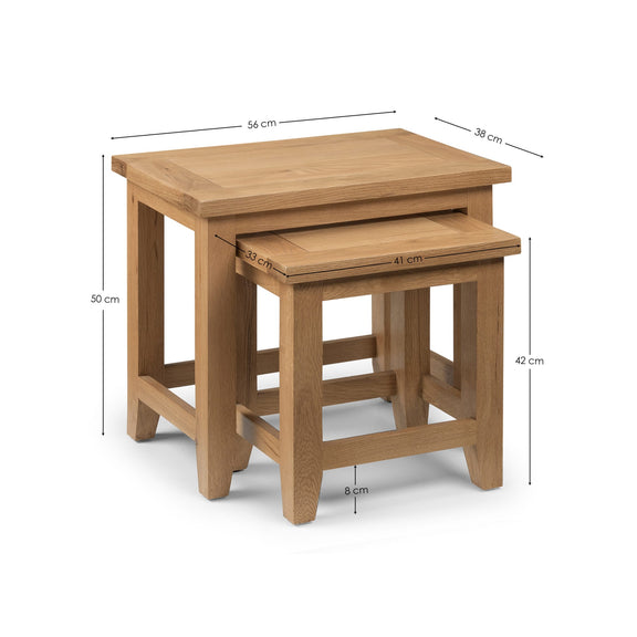 Two wooden nesting tables with dimensions on a white background