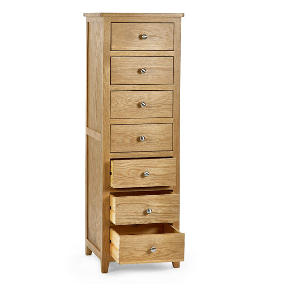 Wooden dresser with five drawers on a white background