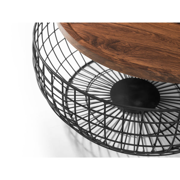 Wooden table with a black metal base on a white background