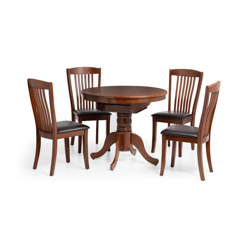 Wooden dining table with four matching chairs on a white background