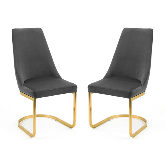 Two black chairs with gold frames on a white background