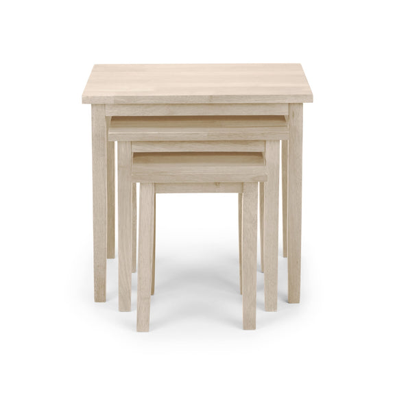 Set of three wooden nesting tables on a white background