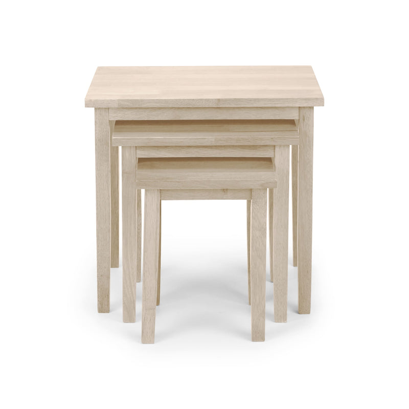 Set of three wooden nesting tables on a white background