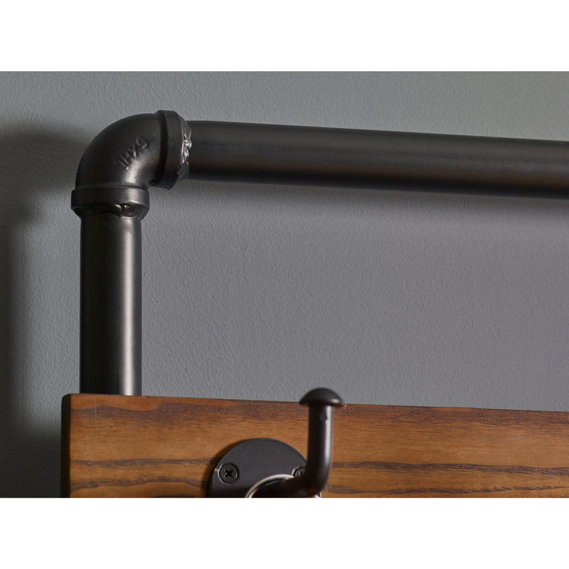 Wooden coat rack with metal pipes against a gray wall