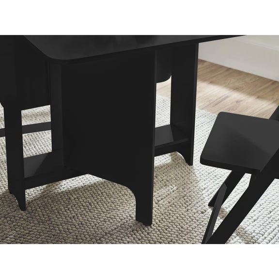 Black dining table and chairs on a textured floor