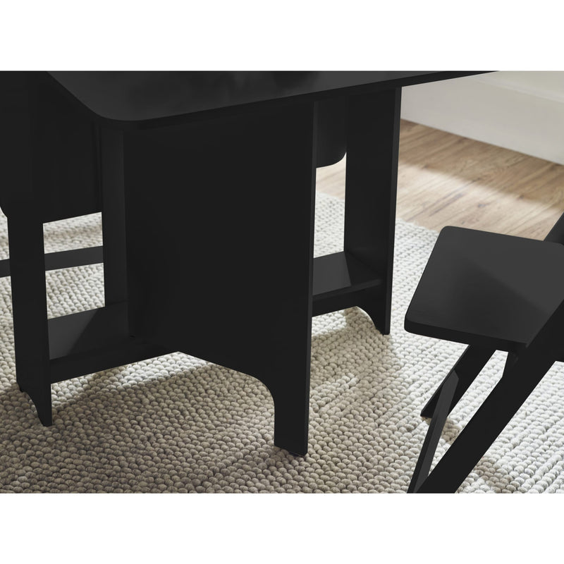 Black dining table and chairs on a textured floor