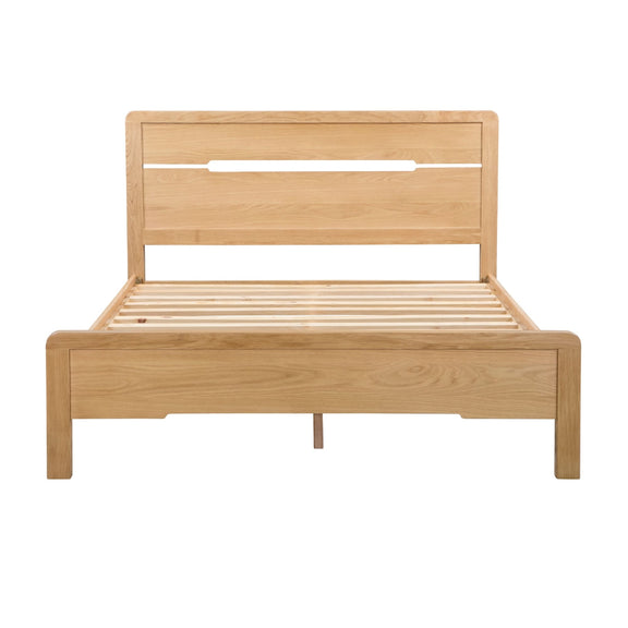 Wooden bed frame on a white background
