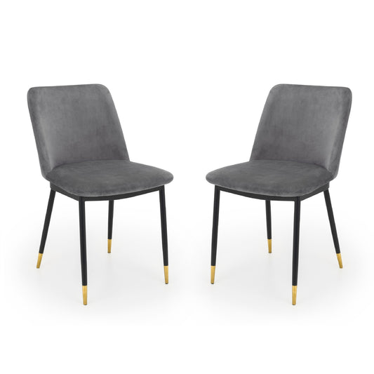 Two gray chairs with black legs on a white background