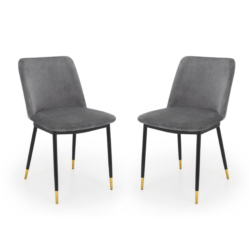Two gray chairs with black legs on a white background