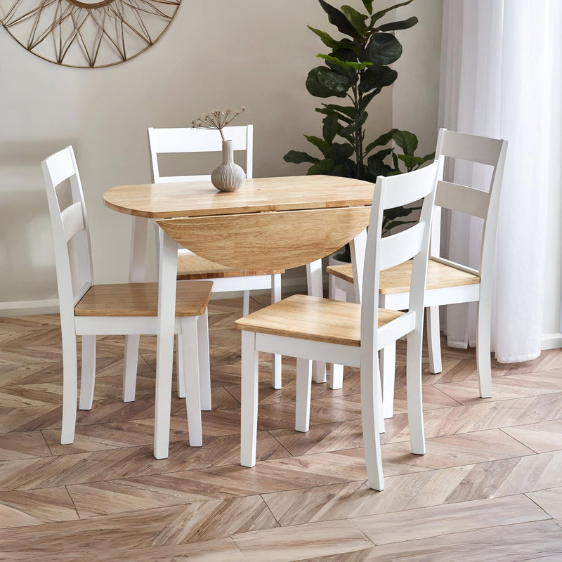 Dining set with wooden table and chairs on a wooden floor
