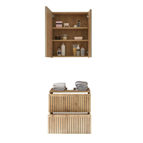 Wooden bathroom cabinet with open doors displaying toiletries and towels on a white background