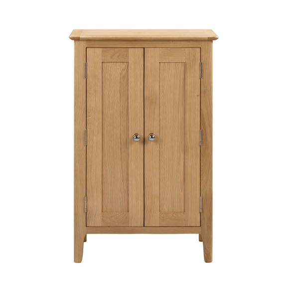 Wooden cabinet with two doors on a white background
