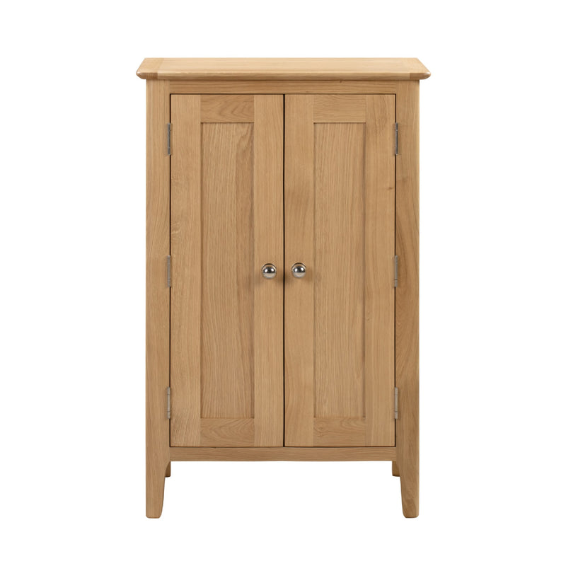 Wooden cabinet with two doors on a white background