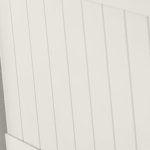 Close-up of a white wooden panel with vertical slats