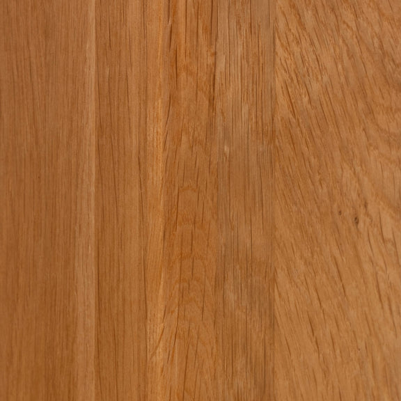 Close-up of a wooden surface with a warm brown color.