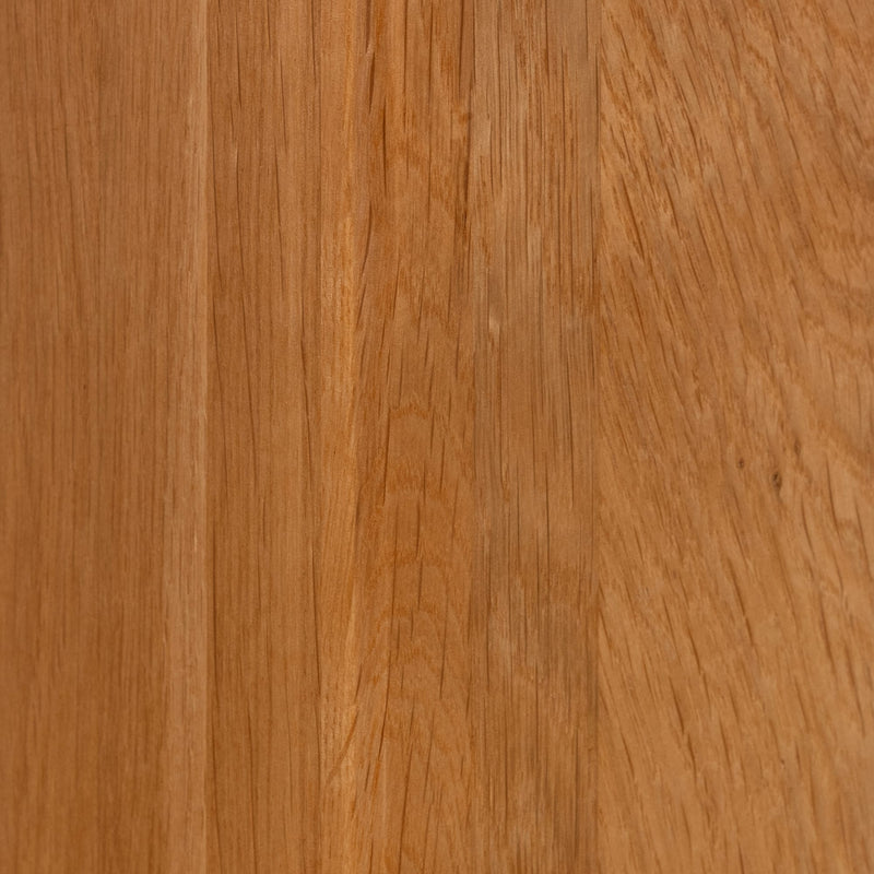 Close-up of a wooden surface with a warm brown color.
