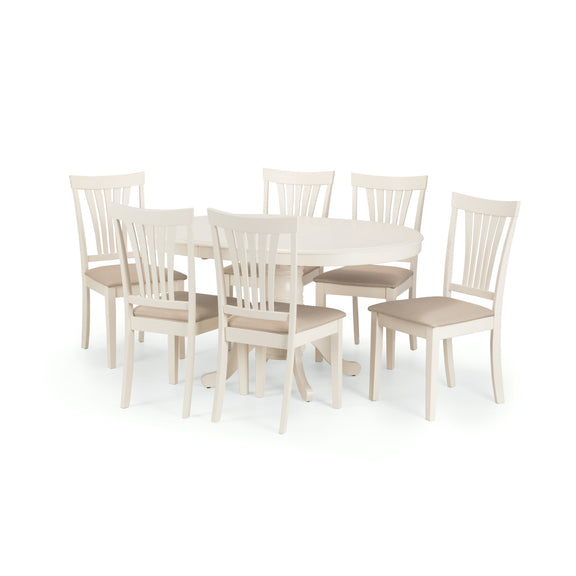 White dining table with six matching chairs on a white background