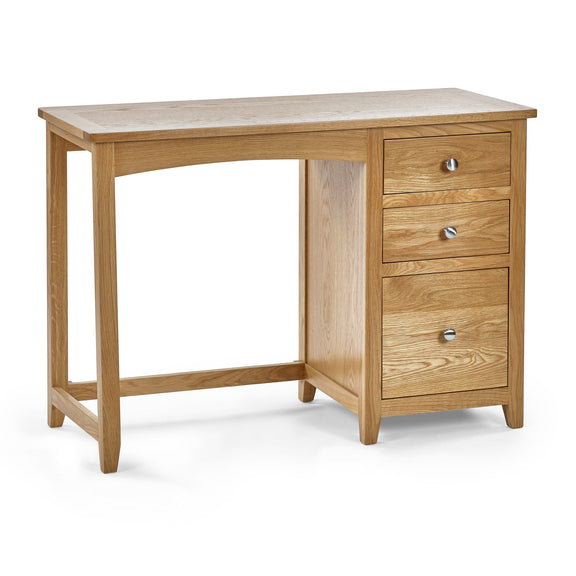 Wooden desk with three drawers on a white background