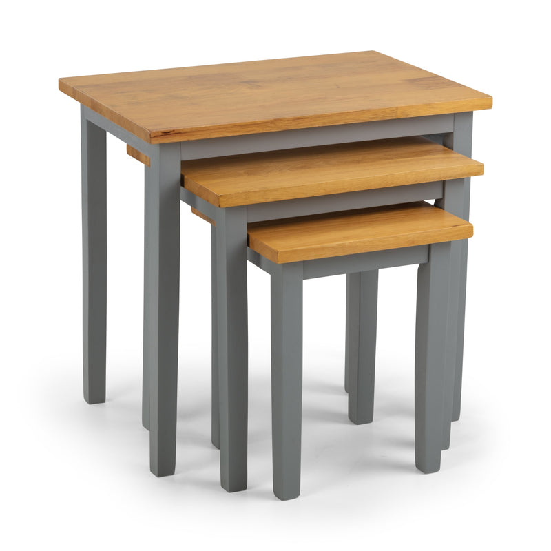 Set of three nesting tables with wooden tops and gray bases on a white background