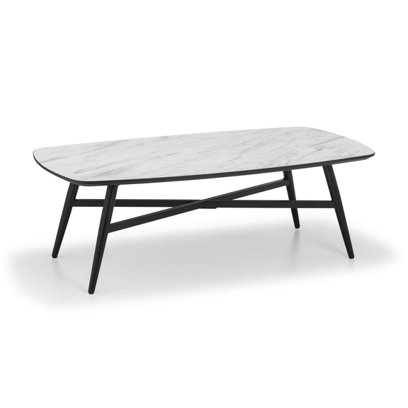 Coffee table with marble top and black metal legs on a white background
