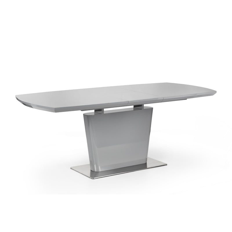 Modern dining table with a sleek design on a white background